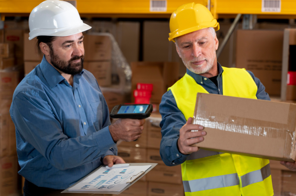Male Inspecting in Warehouse